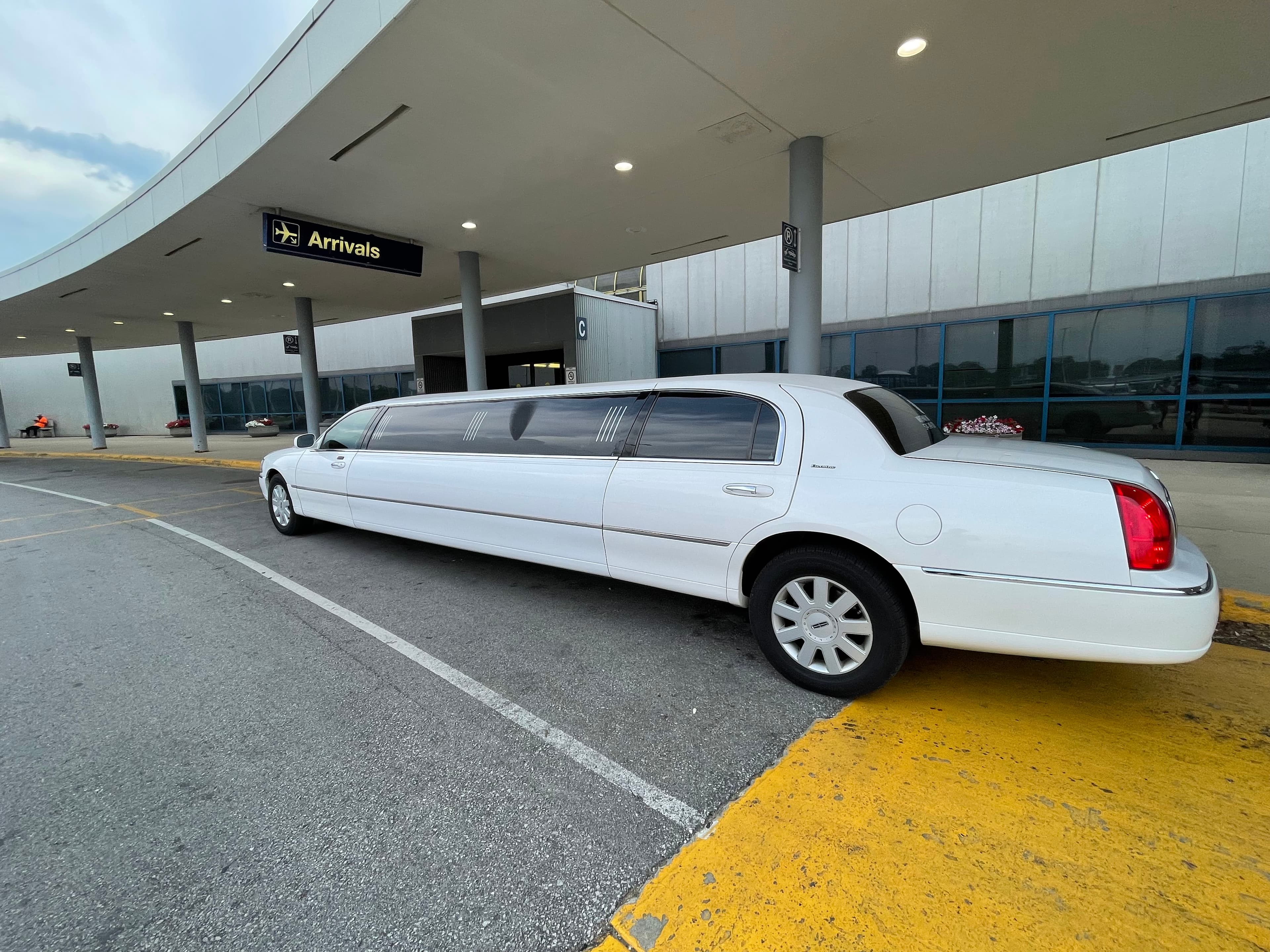 Cadillac Escalade stretch limo for airport transportation