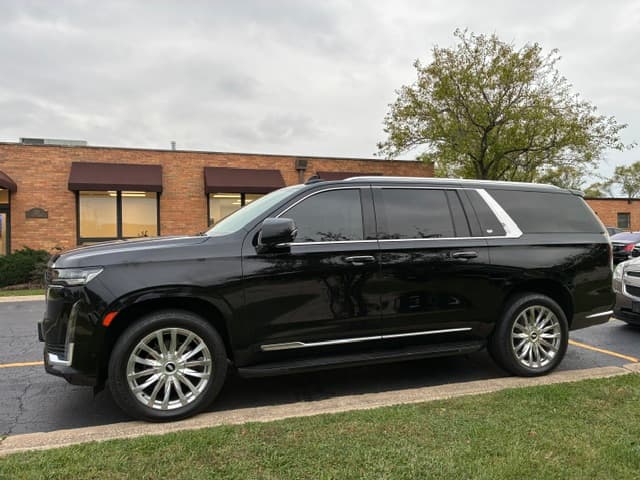Black Cadillac Escalade side profile